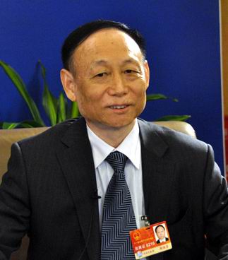 晶龙集团董事长_帅特龙集团董事长照片